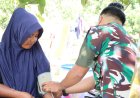 Sentuh Masyarakat Pesisir, Tim Kesehatan TMMD Ke-129 Kodim 0313/KPR Lakukan Pemeriksaan Kesehatan Warga