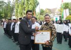 Hari Pengayoman ke-81, Husni Tamrin Terima Penghargaan Mitra Kerja untuk Pemkab Pelalawan